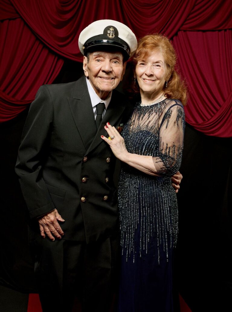 Navy chief veteran in uniform with his wife at the 2025 Military Ball